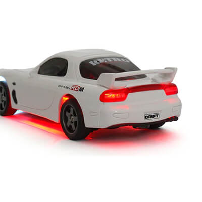 Drifting White Mazda RX 7